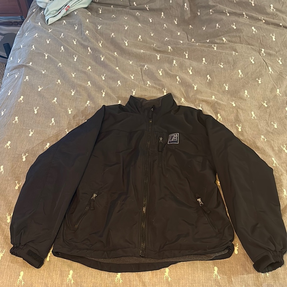 Duluth trading winter jacket with “A” embroidered on chest.
